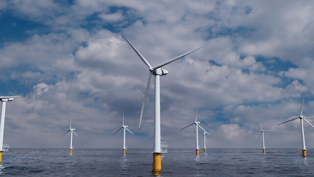 Wind Turbines. Offshore Wind Farm on a Cloudy Afternoon. Renewable Power Concept.