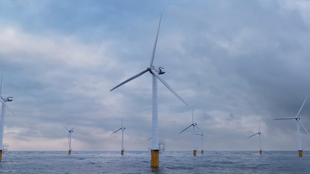 Wind Turbines. Offshore Wind Farm on an Overcast Afternoon. Renewable Energy Concept.