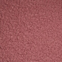 Curly knit boucle fabric texture in dusty pink