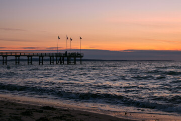 Fototapeta na wymiar Silhouette of a seabridge at dawn