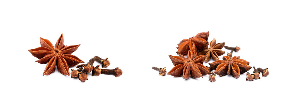 Aromatic star anise and cloves isolated on white background