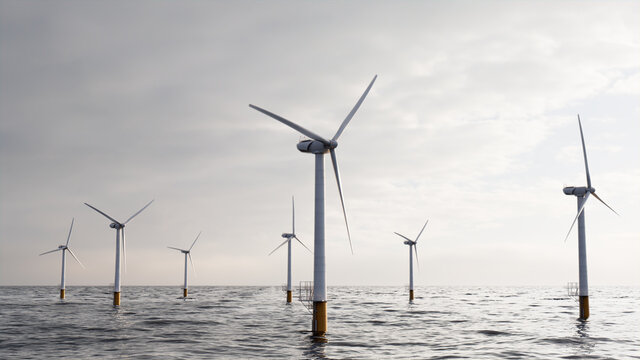Wind Turbines. Offshore Wind Farm at Dawn. Clean Energy Concept.
