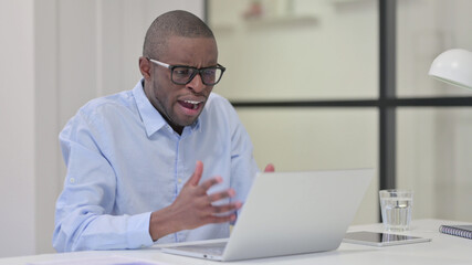 Angry African Man Reacting to Loss at Work, Going Crazy