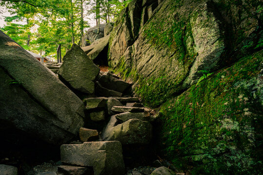Stone steps ascending from the bottom footpath at Purgatory Chasm in Massachusetts