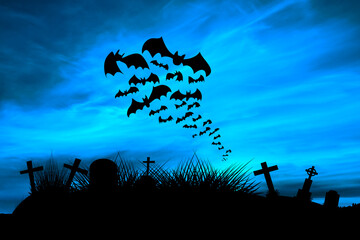 Halloween - stado nietoperzy nad cmentarzem