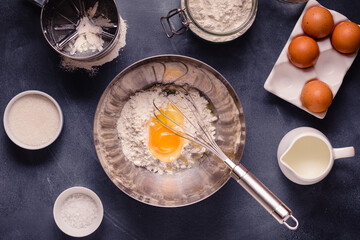 Table with baking products and tools.