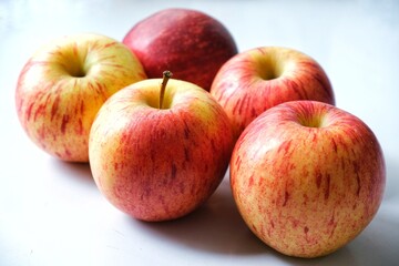 Fototapeta na wymiar Group of fresh Gala apples with white background.