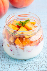 Healthy breakfast. Granola / muesli yoghurt and fruit.