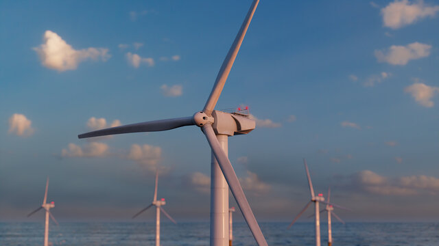 Wind Power. Offshore Wind Turbines at Sunset. Sustainable Power Concept.