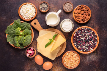 Products rich in calcium on dark background.