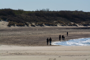 View on wide white sandy North sea beach in Renesse, Zeeland, Netherlands