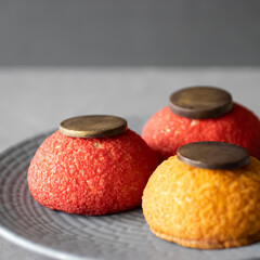 Shu cakes on a gray plate.