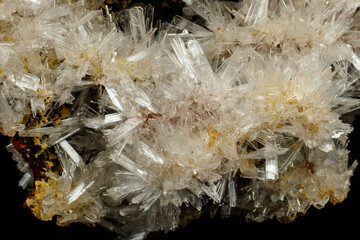 Macro mineral stone crystals Hemimorphite rock on a black background