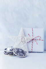 Christmas ornaments on bright wooden background. Copy space. 