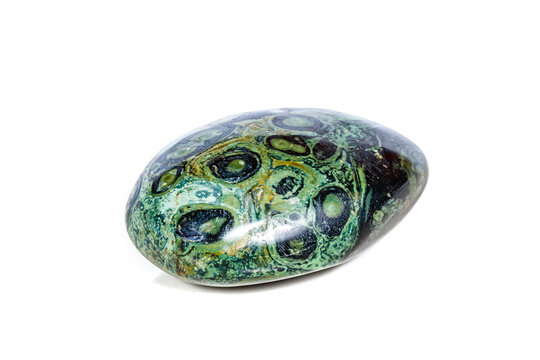 Macro mineral stone jasper kambaba on a white background