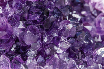 Fototapeta premium Amethyst Crystal Druse macro mineral on white background