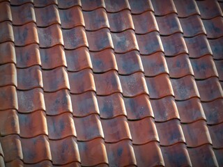 photos of a red roof in a clear sky