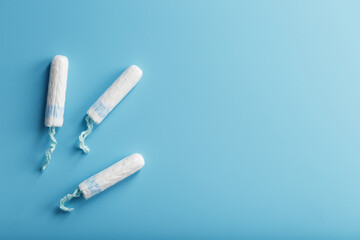 Gynecological tampons on a blue background top view