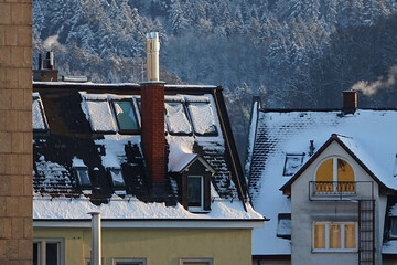 Snow on top of city roofs