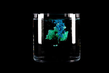 Abstract ink in water on a black background