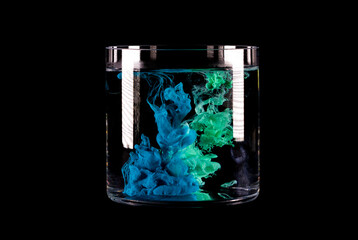 Abstract ink in water on a black background