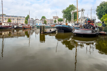 Fototapeta na wymiar Historic harbor at Mallegatsluis in Gouda, Zuid-Holland province, The Netherlands