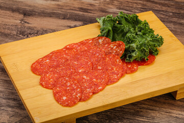 Italian spycy pepperoni sausage slices