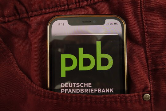 KONSKIE, POLAND - August 17, 2021: Deutsche Pfandbriefbank AG logo on mobile phone hidden in jeans pocket