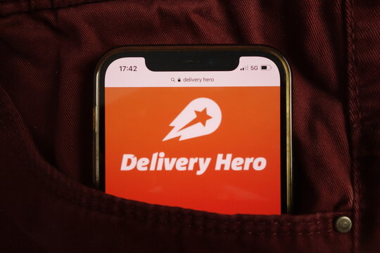KONSKIE, POLAND - August 17, 2021: Delivery Hero SE logo on mobile phone hidden in jeans pocket