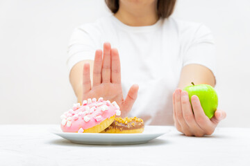 Girl refuses to eat donuts to loose weight
