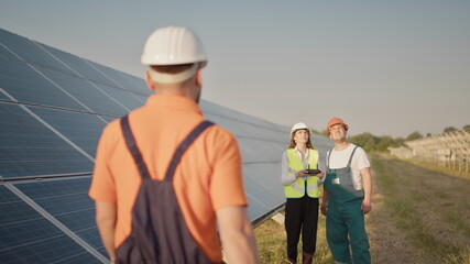 Technician and investor Using Infrared Drone Technology to Inspect Solar Panels and Wind Turbines in Solar cell Farm, Solar cells will be an important renewable energy of the future. Solar panel