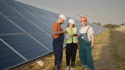 Technician and investor Using Infrared Drone Technology to Inspect Solar Panels and Wind Turbines...