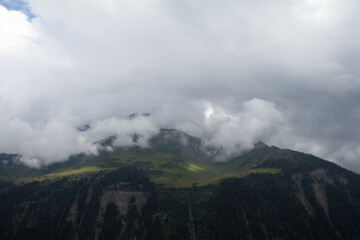 Amazing Landscape in the hearth of Switzerland. Epic scenery with the clouds and fog. Wonderful sunrays through the clouds and later an amazing sunset and sunrise. Perfect roadtrip through Switzerland