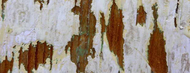 peeling paint on wooden background