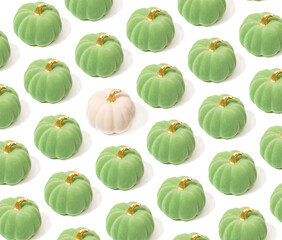 Seamless pattern of green pumpkins.