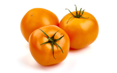 Fresh yellow tomatoes, isolated on white background.