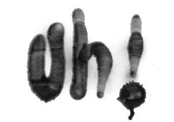 Black spray stain word uh isolated on white background, photo with clipping path