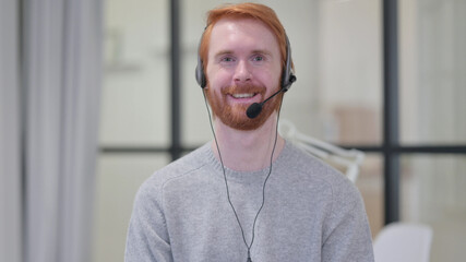 Smiling Beard Redhead Man Wearing Headset with Mic 