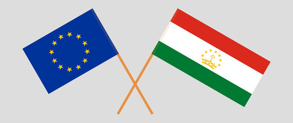 Crossed flags of the European Union and Tajikistan. Official colors. Correct proportion