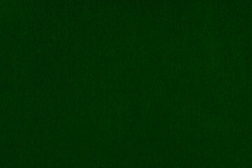 Dark non-uniform paper with spots and inclusions.