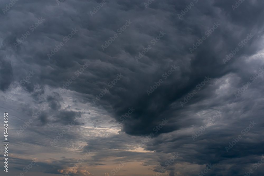 Wall mural gray cumulus clouds over the earth