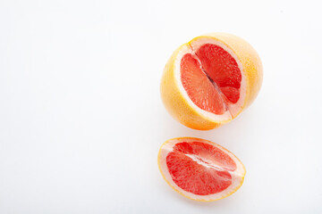 red grapefruit on a white background