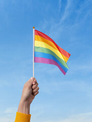 Lgtb rainbow flag waving ona blue sky. Lgtb movement. 