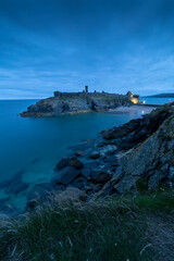 Fototapeta na wymiar Long exposure Peel Castle, Isle of Man, just after sunset - Landscape