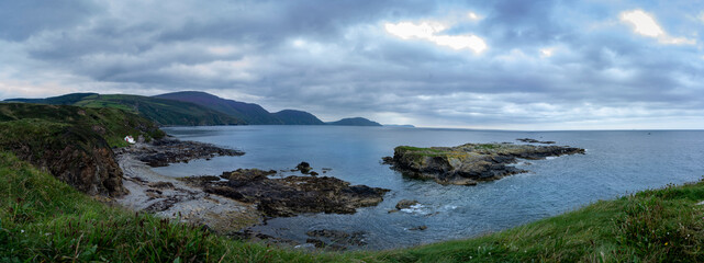 Fototapeta na wymiar Panorama of Nairbyl bay showing the entire southern coast of the Isle of Man