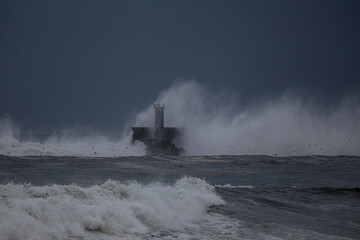 Fototapeta na wymiar Leixoes harbor entrance during storm