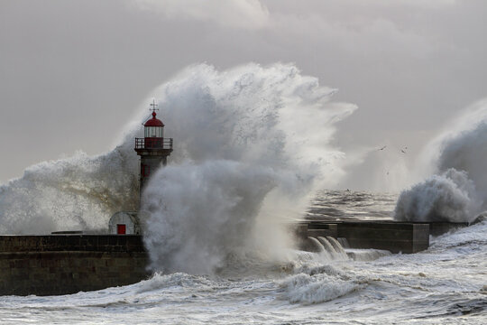Big wave splash at the lighthouse