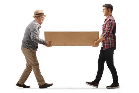 Young and elderly man carrying a cardboard box