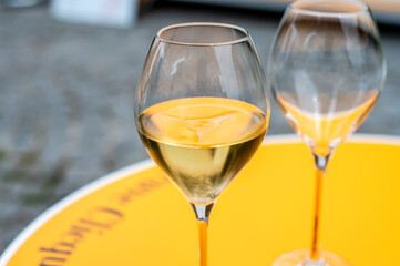 Tasting of brut champagne sparkling wine during visit caves in champagne house in Reims, France