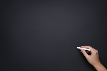 study background, hand writes with chalk on a blank school board, study concept, school, college,...
